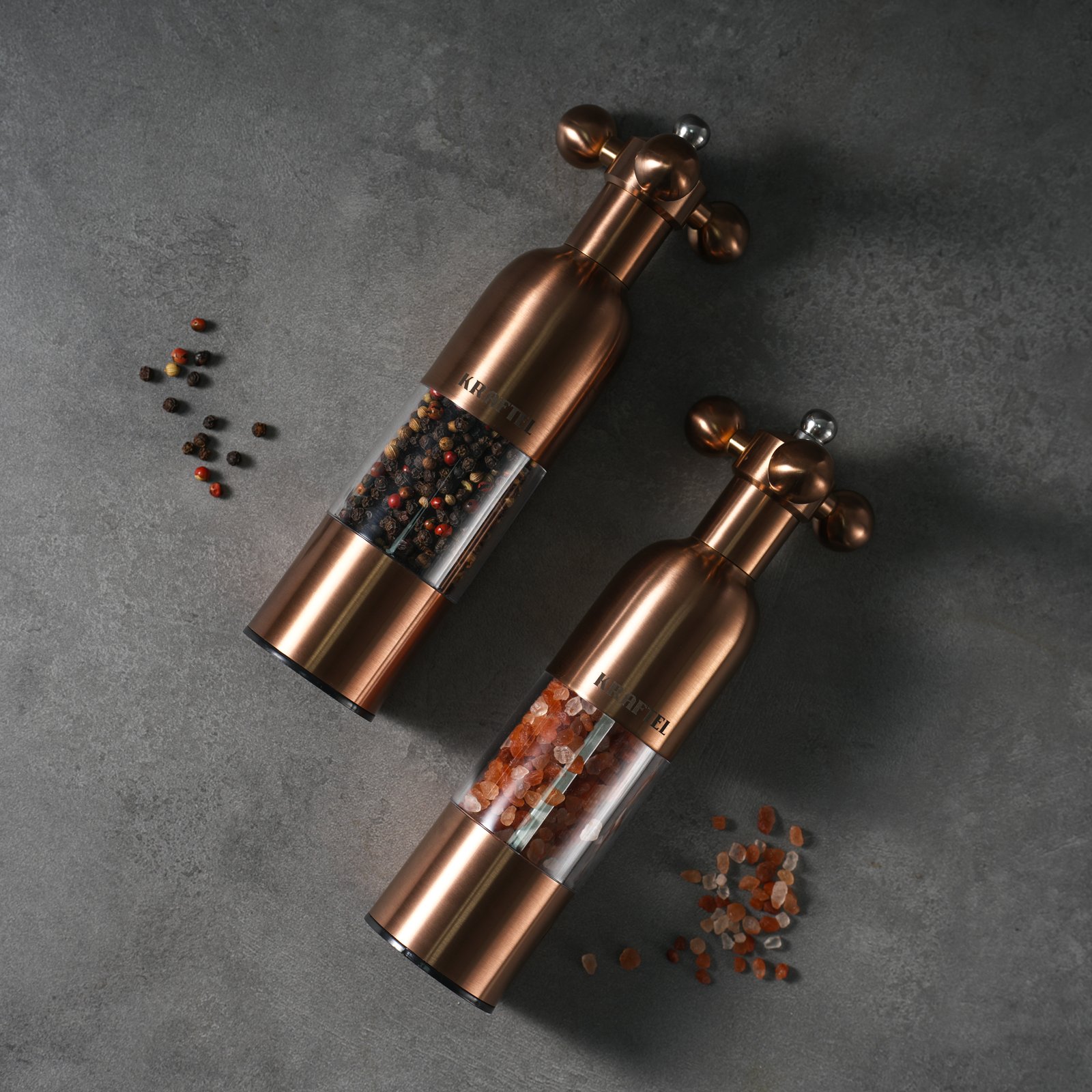 Kraftel premium salt and pepper grinder set — copper-finish 304 stainless steel manual grinders with valve-handle tops